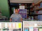 jackson-malau-saat-menjalankan-usaha-fotokopi-sambil-menjadi-agenbrilink.jpg