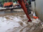 jakarta-siaga-3-ketinggian-770-cm-di-pintu-air-manggarai_20230224_175549.jpg