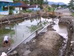 jalan-jadi-kolam-kubangan_20160621_144725.jpg