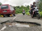 jalan-rusak-di-perbatasan-majalengka-dan-ciamis_20230507_221029.jpg