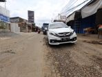 jalan-rusak-di-wanaherang_20170125_134138.jpg