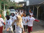 jalan-santai-yang-digelar-oleh-relawan-mas-bowo.jpg