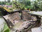 jalur-bukittinggi-padang-putus-setelah-jembatan-pinyaram-ambruk-se.jpg