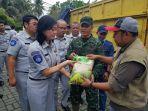 jasa-raharja-berikan-bantuan-ke-korban-tsunami-selat-sunda.jpg