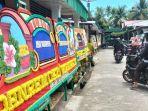 jejeran-karangan-bunga-menjelang-kediaman-pratu-anumerta-m-syukra-ilhamda-di-pariaman.jpg