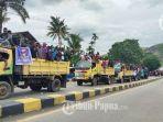 jejeran-kendaraan-yang-mengangkut-massa-aksi-bela-lukas-enembe.jpg