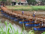 jembatan-apung-sungai-citarum_20190520_080928.jpg
