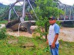 jembatan-sinandaka-di-bolsel-putus-akibat-banjir.jpg