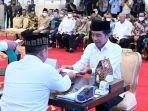 jokowi-bayar-ke-rozak.jpg