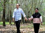 jokowi-dan-iriana-gandengan-tangan.jpg