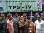jokowi-dan-iriani-di-tps_20170215_110427.jpg