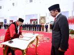 jokowi-melantik-arsul-sani-sebagai-hakim-konstitusi-mk-gantikan-wahiduddin-adams-di-istana.jpg