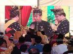 jokowi-menyandang-gelar-adat-melayu.jpg