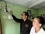 jokowi-sambungkan-listrik-gratis-bagi-warga-di-bogor_20181202_145747.jpg