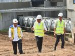 jokowi-tinjau-proses-pembangunan-sodetan-kali-ciliwung_20230124_223829.jpg