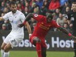 jordi-amat-kiri-ketika-membela-swansea-city.jpg