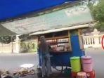 jualan-es-kelapa-di-pinggir-lintasan-balap.jpg