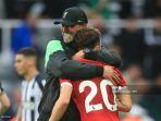 jurgen-klopp-berpelukan-dengan-diogo-jota.jpg