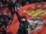 jurgen-klopp-melakukan-selebrasi-usai-pertandingan-sepak-bola-leg-pertama.jpg