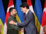 justin-trudeau-dan-zelensky-berjabat-tangan-pada-akhir-konferensi-pers-di-parliament.jpg