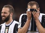 juventus-giorgio-chiellini-dan-gonzalo-higuian-vs-real-madrid_20180403_183152.jpg
