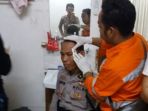 kabag-ops-polres-murungraya-luka-kena-lemparan-batu_20180603_095625.jpg