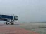kabut-tebal-di-bandara-ssk-ii-pekanbaru.jpg