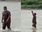 kades-nyebur-ke-sungai.jpg