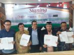 kahmipreneur-melakukan-penandatanganan-kesepakatan-mou-dengan-tiga-lembaga_20180502_161635.jpg