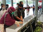 kai-daop-1-di-stasiun-senen-sediakan-tempat-cuci-tangan-publik_20200329_183504.jpg