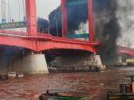 kapal-meledak-di-sungai-musi.jpg
