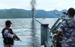 kapal-nelayan-asing-ilegal-ditenggelamkan-tni-al_20141205_153707.jpg