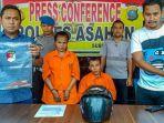 kapolres-asahan-akbp-faisal-napitupulu-kiri-menunjukkan-barang.jpg