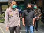 kapolres-gresik-akbp-kusworo-kiri-bersama-tersangka-sg-kanan.jpg
