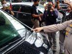 kapolresta-solo-kombes-pol-ade-safri-simanjuntak-menunjukan-bagian-mobil-toyota-alphard.jpg