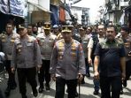 kapolri-kunjungi-lokasi-kebakaran-depo-pertamina-plumpang_20230304_170431.jpg