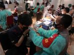 kapolri-kunjungi-sentra-vaksinasi-kompas-gramedia_20210701_185842.jpg