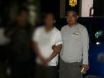 kapolsek-beruntung-baru-iptu-khamdari-bersama-tersangka_20180222_131415.jpg
