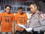 kapolsek-sunggal-kompol-wira-prayatna-saat-menginterogasi-dua-tersangka_20180109_183607.jpg