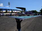 karangan-bunga-di-area-patung-kepala-singa-stadion-kanjuruhan_20221004_203016.jpg