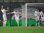 karim-benzema-2l-melakukan-selebrasi-setelah-mencetak-gol.jpg