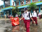 kasus-covid-19-melonjak-ptm-di-kota-bandung-dibatasi-jadi-50-pe_20220208_082408.jpg