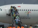 kedatangan-haji-embarkasi-di-bandara-adi-soemarmo-solo_20151005_093223.jpg