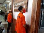 kedua-tersangka-penyebar-berita-bohong-korban-pembegalan-di-polrestro-jakarta-selatan.jpg