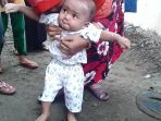 kehebohan-tedhak-siti-tradisi-jawa-yang-sarat-makna_20161220_141822.jpg