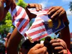 kekecewaan-berujung-pembakaran-bendera-malaysia_20170822_172245.jpg