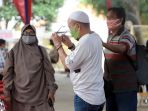 keluarga-korban-jatuhnya-sriwijaya-air-sj182-datangi-posko-antemortem-rs-polri_20210112_134725.jpg