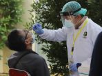 keluarga-korban-jatuhnya-sriwijaya-air-sj182-datangi-posko-antemortem-rs-polri_20210112_150001.jpg
