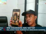 keluarga-menunjukkan-foto-korban-sandera-kelompok-abu-sayyaf.jpg