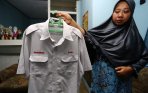 keluarga-tunjukan-baju-kerja-saiful-rakhmad_20150129_163824.jpg